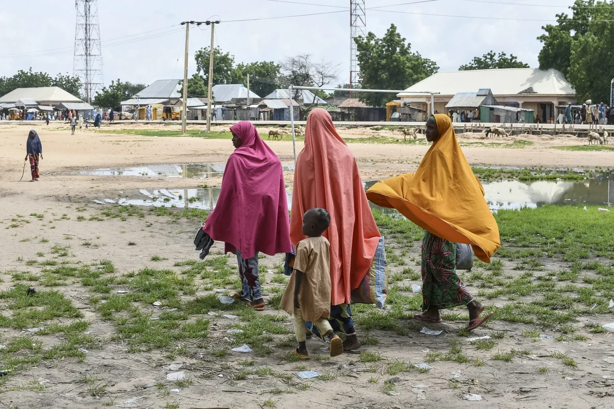 Survivors and relatives of victims gather in Babban Gide following a suspected Boko Haram attack. At least 81 lives were lost, with numerous others reported missing after an assault carried out by suspected jihadists in Yobe State, northeastern Nigeria.