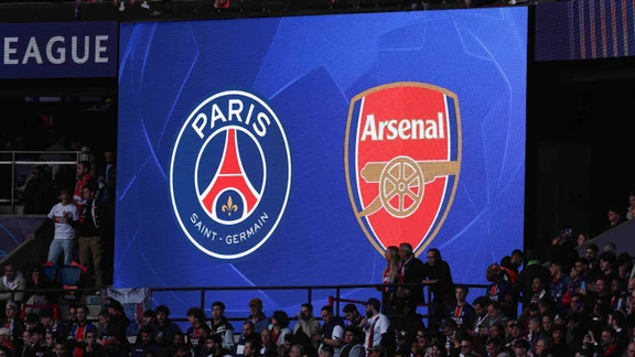 PSG and Arsenal players in action during a Champions League match