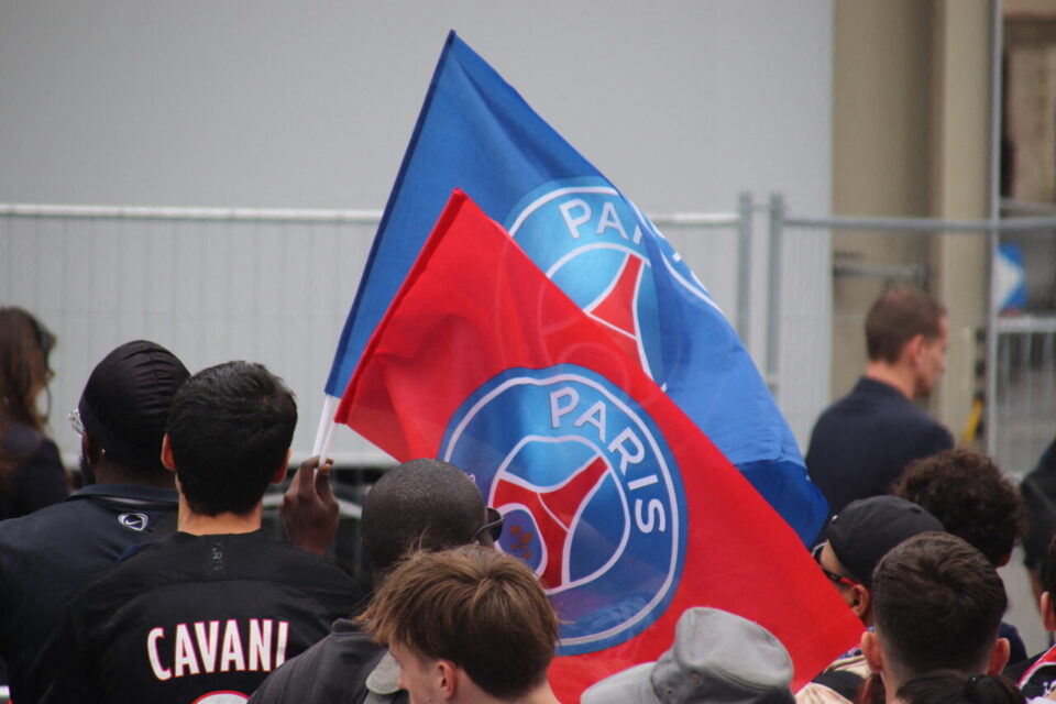PSG players celebrating on the Champs-Élysées after a previous victory