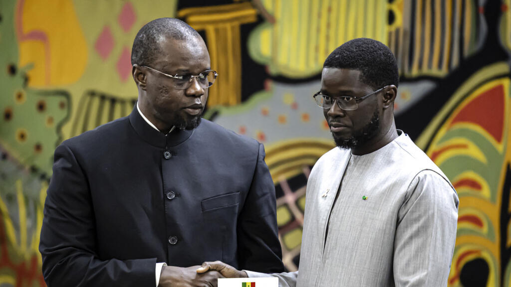 Former Senegalese Prime Minister Ousmane Sonko (left) and President Bassirou Diomaye Faye (right) at the presidential palace in Dakar, October 16, 2025.