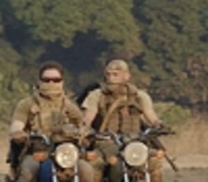 Two Wagner Group mercenaries on motorcycles in a Central African province