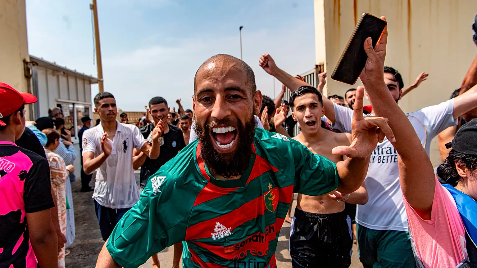 Migrants crossing from Morocco into Spain's Ceuta enclave amid chaotic scenes on July 30, 2026 (AP Photo/Antonio Sempere)