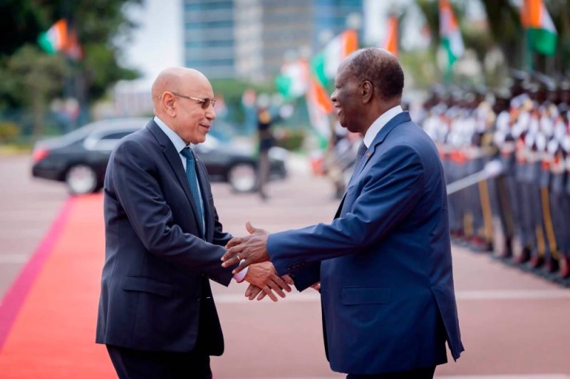 President Ouattara and President Ghazouani shaking hands during bilateral talks