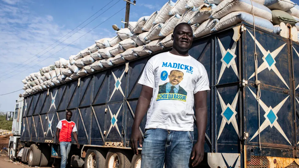 Long line of trucks waiting at the Senegal-Mali border